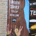 Poster van Tivoli in Utrecht, erg vergelijkbaar met onze poster van SuitSupply Reversed.